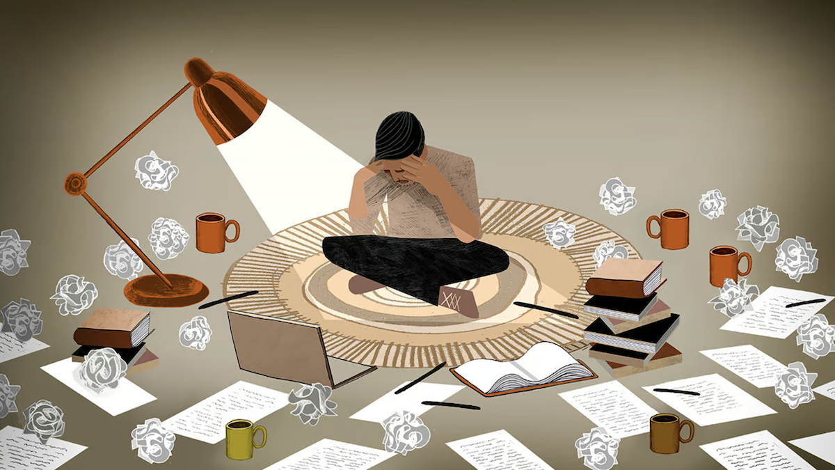 A person in the centre of the picture, sitting on a carpet on the floor, surrounded by scrap of papers and notes unable to cope with the overwhelming situation in which perfectionism put them.